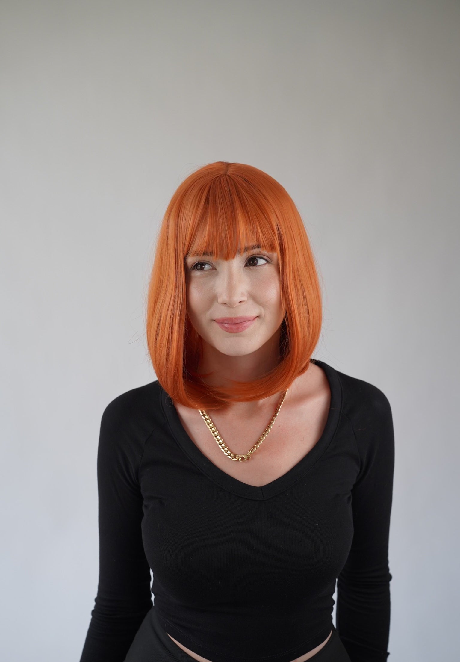 Ginger Bob Wig Wispy Bangs Orange Short Wig Cosplay Wig Realistic Synthetic Wigs for Women 12 inch