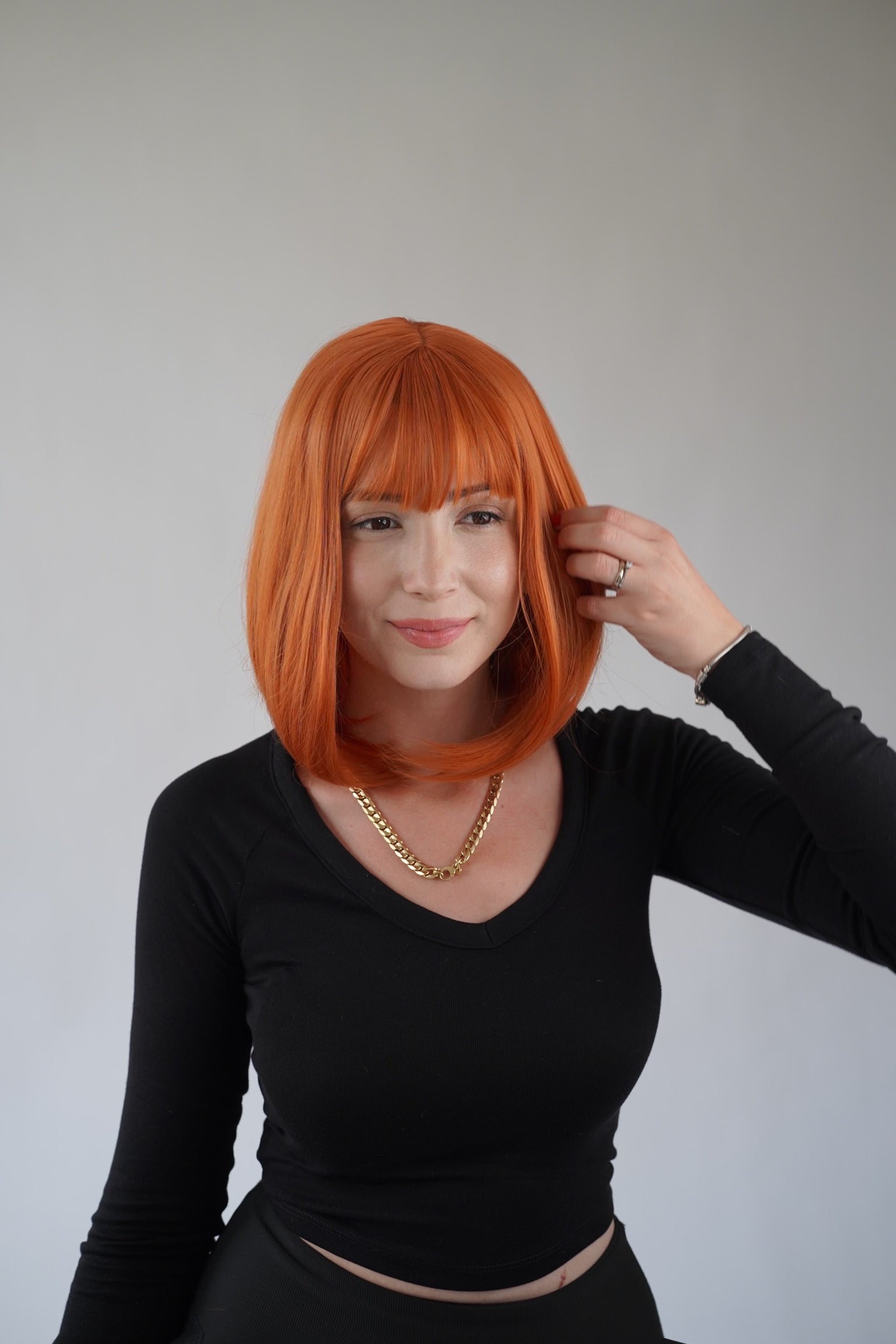 Ginger Bob Wig Wispy Bangs Orange Short Wig Cosplay Wig Realistic Synthetic Wigs for Women 12 inch