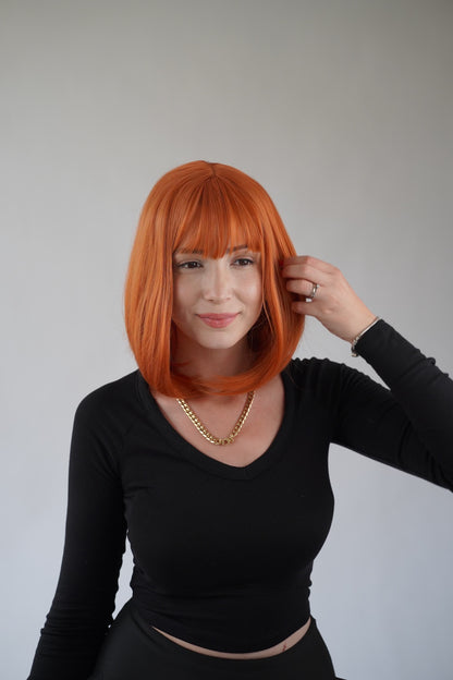 Ginger Bob Wig Wispy Bangs Orange Short Wig Cosplay Wig Realistic Synthetic Wigs for Women 12 inch
