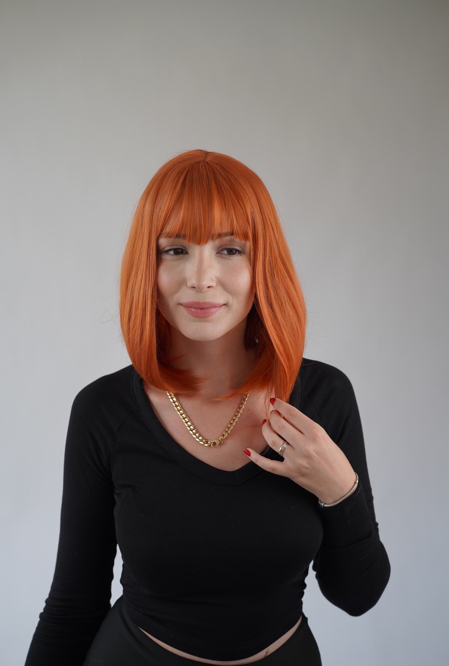 Ginger Bob Wig Wispy Bangs Orange Short Wig Cosplay Wig Realistic Synthetic Wigs for Women 12 inch