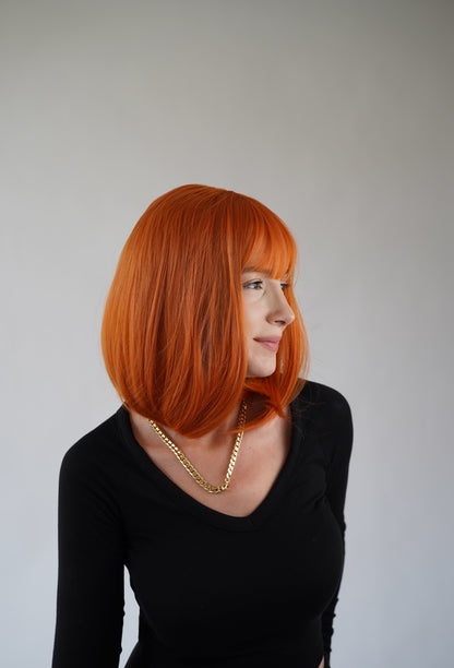 Ginger Bob Wig Wispy Bangs Orange Short Wig Cosplay Wig Realistic Synthetic Wigs for Women 12 inch