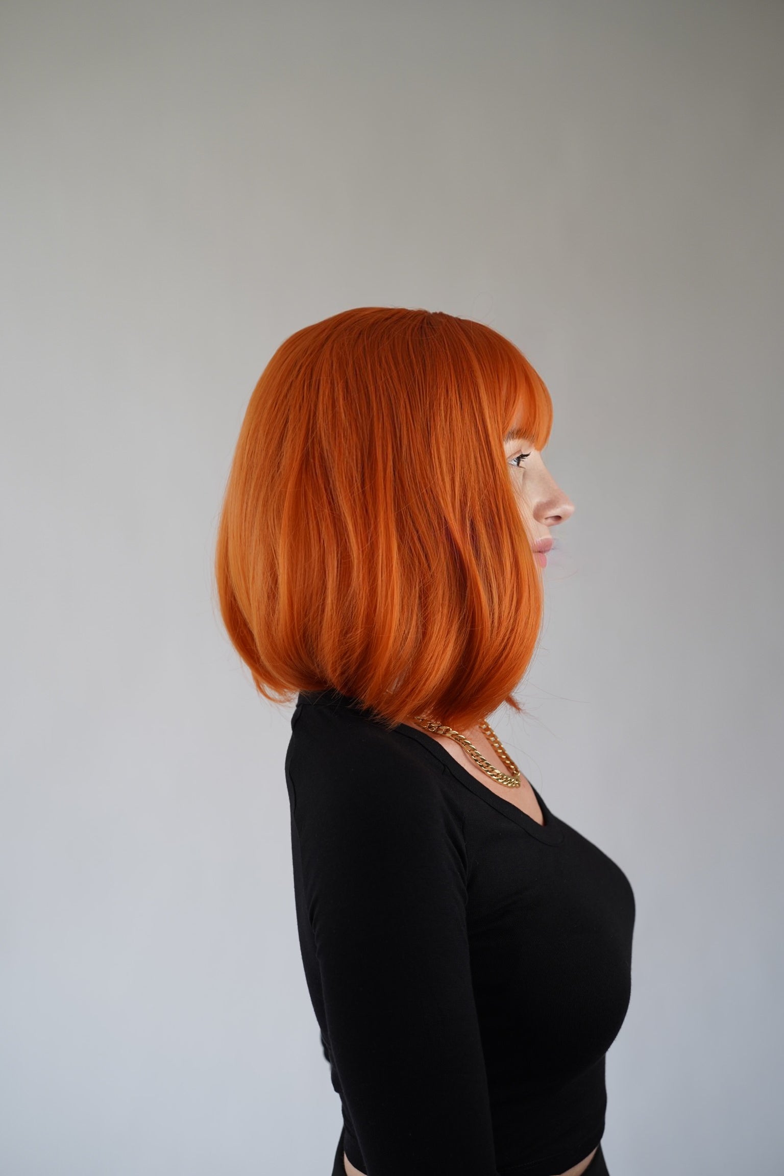 Ginger Bob Wig Wispy Bangs Orange Short Wig Cosplay Wig Realistic Synthetic Wigs for Women 12 inch