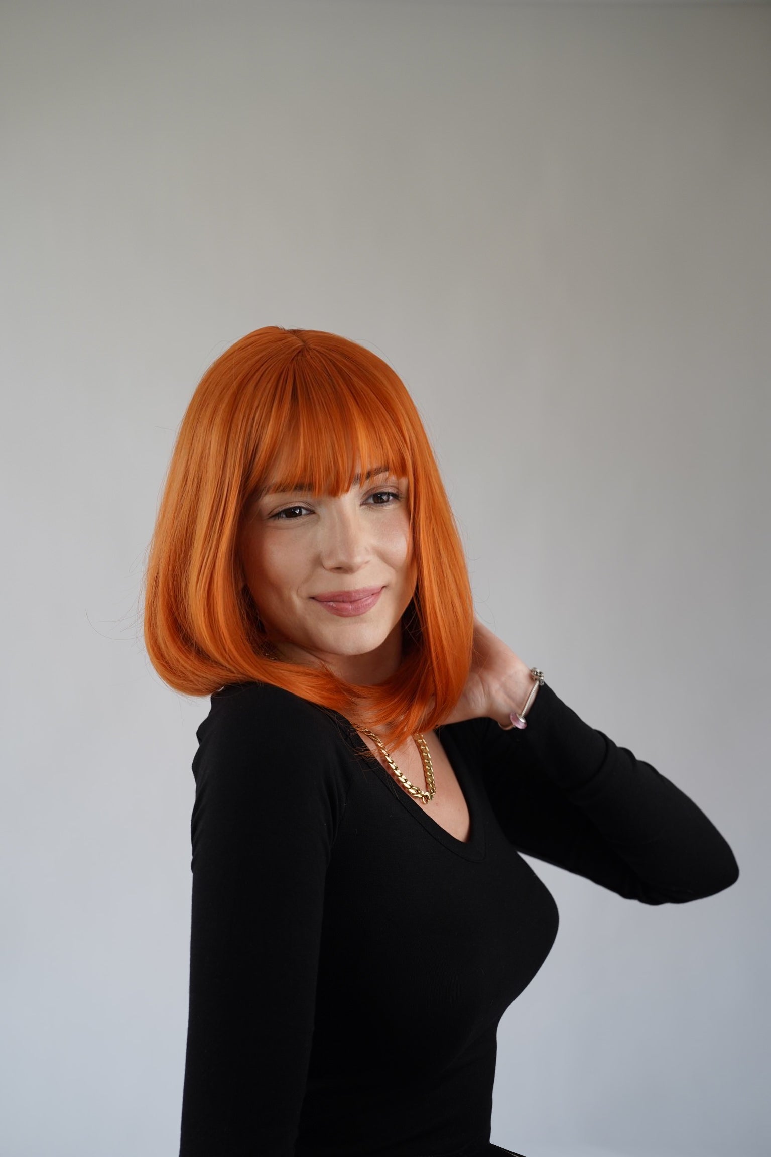 Ginger Bob Wig Wispy Bangs Orange Short Wig Cosplay Wig Realistic Synthetic Wigs for Women 12 inch