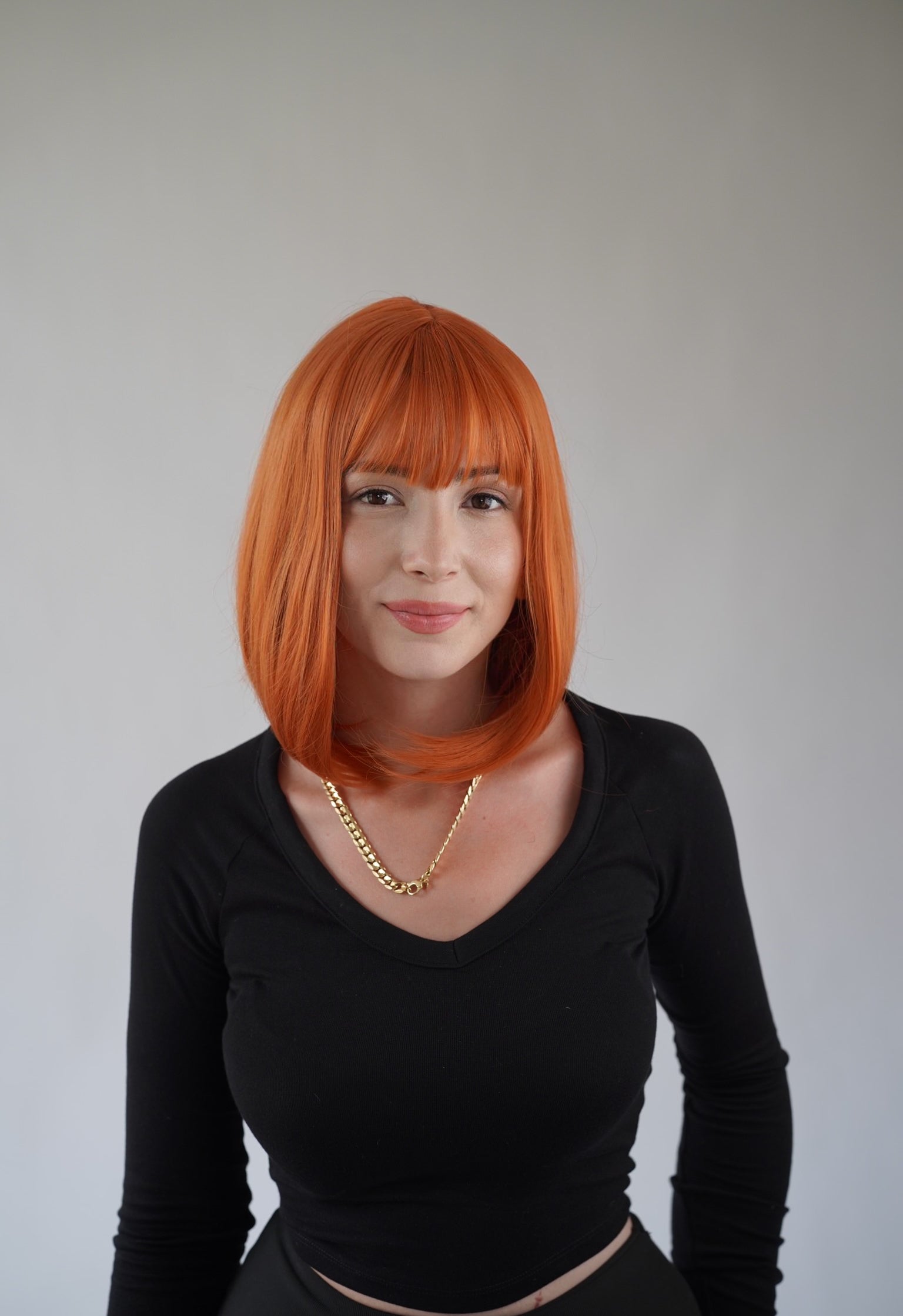 Ginger Bob Wig Wispy Bangs Orange Short Wig Cosplay Wig Realistic Synthetic Wigs for Women 12 inch